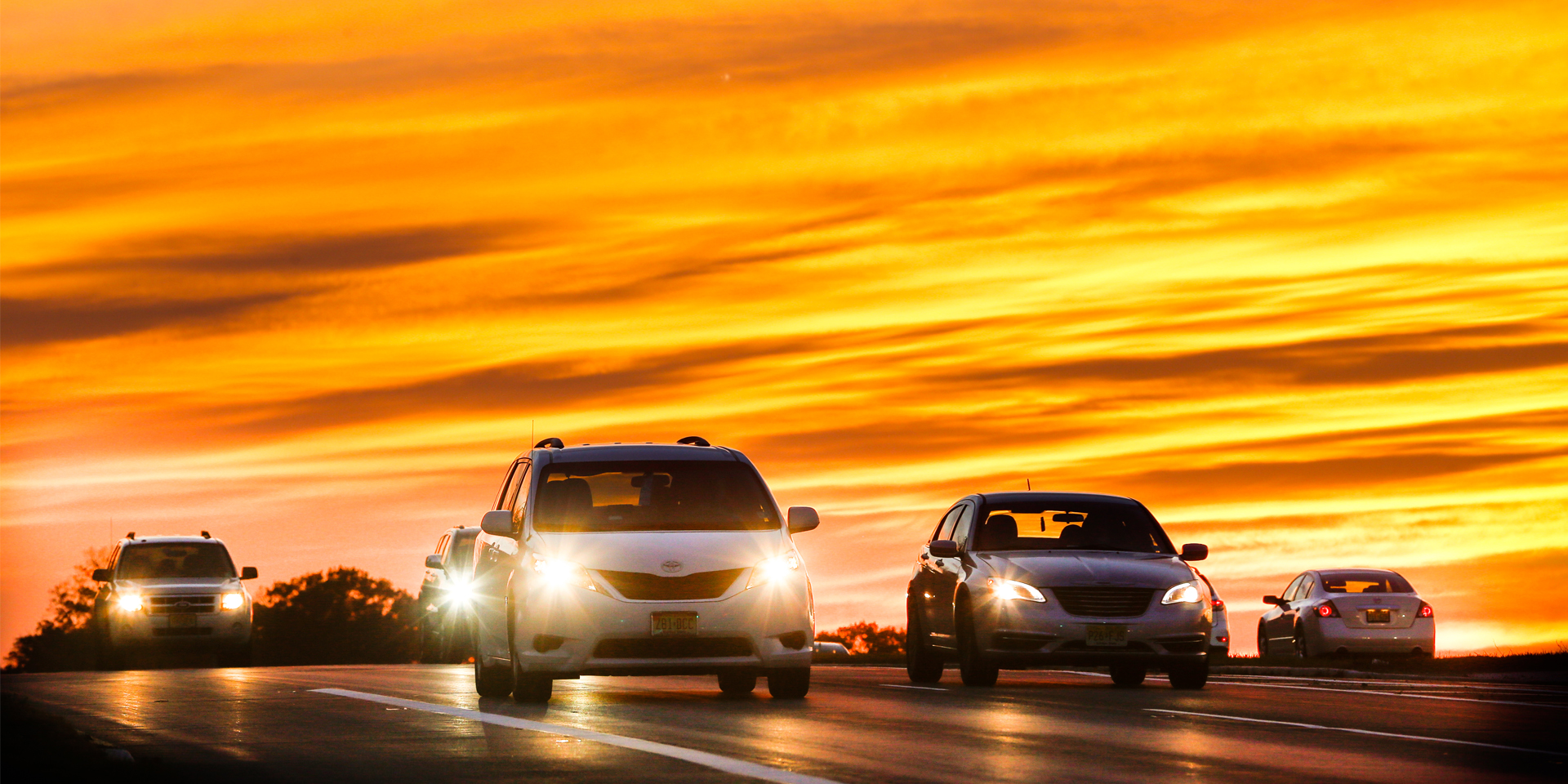 Cars traveling on a road.