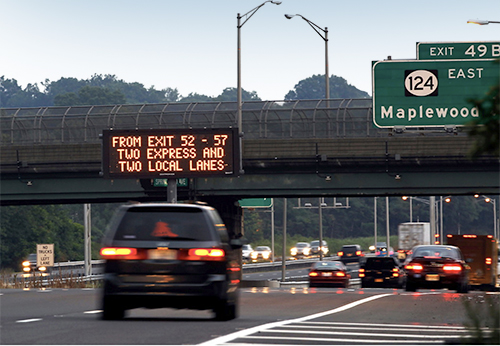 A road sign on a highway.