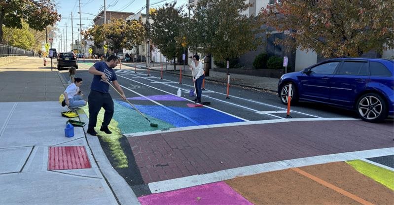 Jersey City traffic calming example people painting street