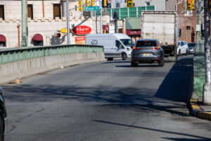 Cars travel along Passaic Street Bridge.