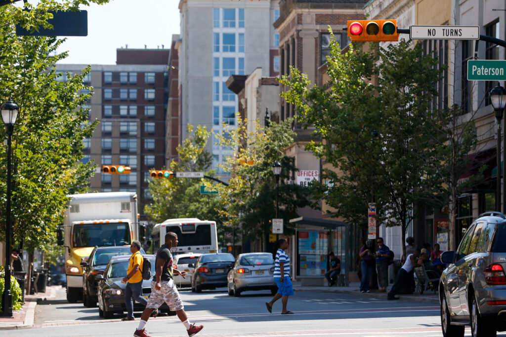 People crossing the street in downtown New Brunswick.
