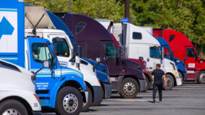 Tractor trailers parked in a parking lot