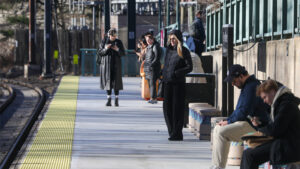 Passengers waiting for the Montclair train. Photo by Ed Murray.