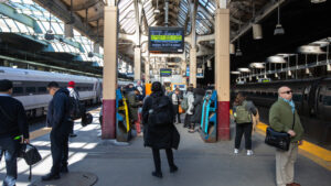 Transit riders waiting for their train at Newark Penn Station.