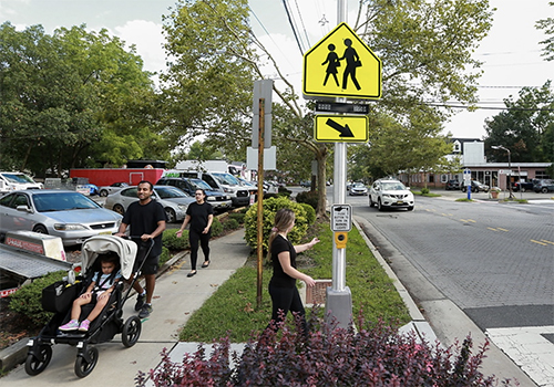 People walking on the sidewalk