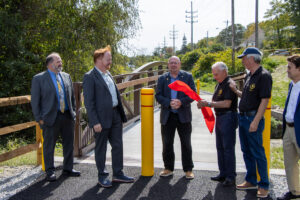 Officials conclude ribbon cutting ceremony for Highlands Rail Trail.