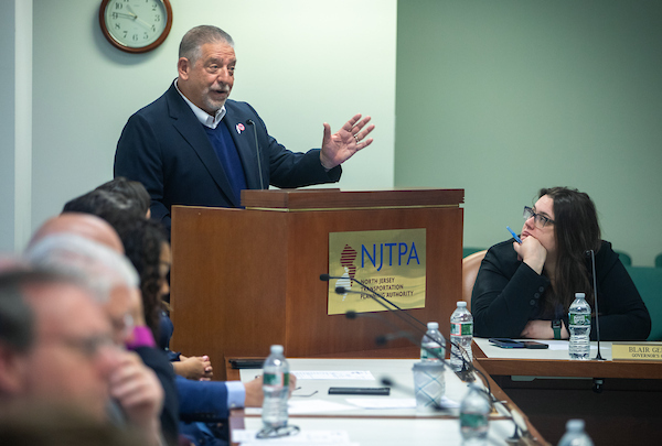 Meadowlands Chamber President and CEO Jim Kirkos at podium speaking to NJTPA Board of Trustees.