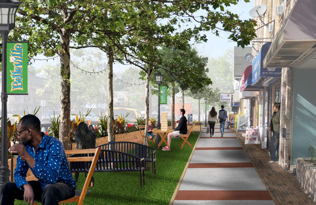 A rendered street view looking down a street, showing storefronts, sidewalk, and parklets separating sidewalk from street