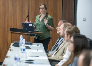 Megan Massey of NJ TRANSIT speaks at podium during NJTPA Board meeting.