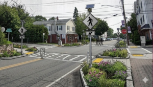 AI rendered image: pedestrian safety enhancement concept at Springfield and Summit Avenues intersection.